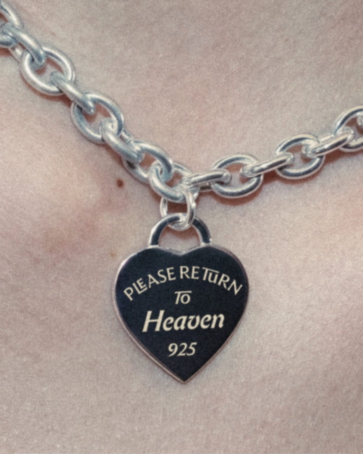Ceraph engraved on a silver heart tag: Please return to Heaven, 925