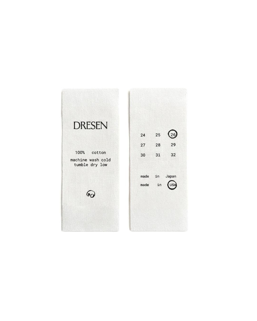 Dresen identity: both sides of the woven care and size labels